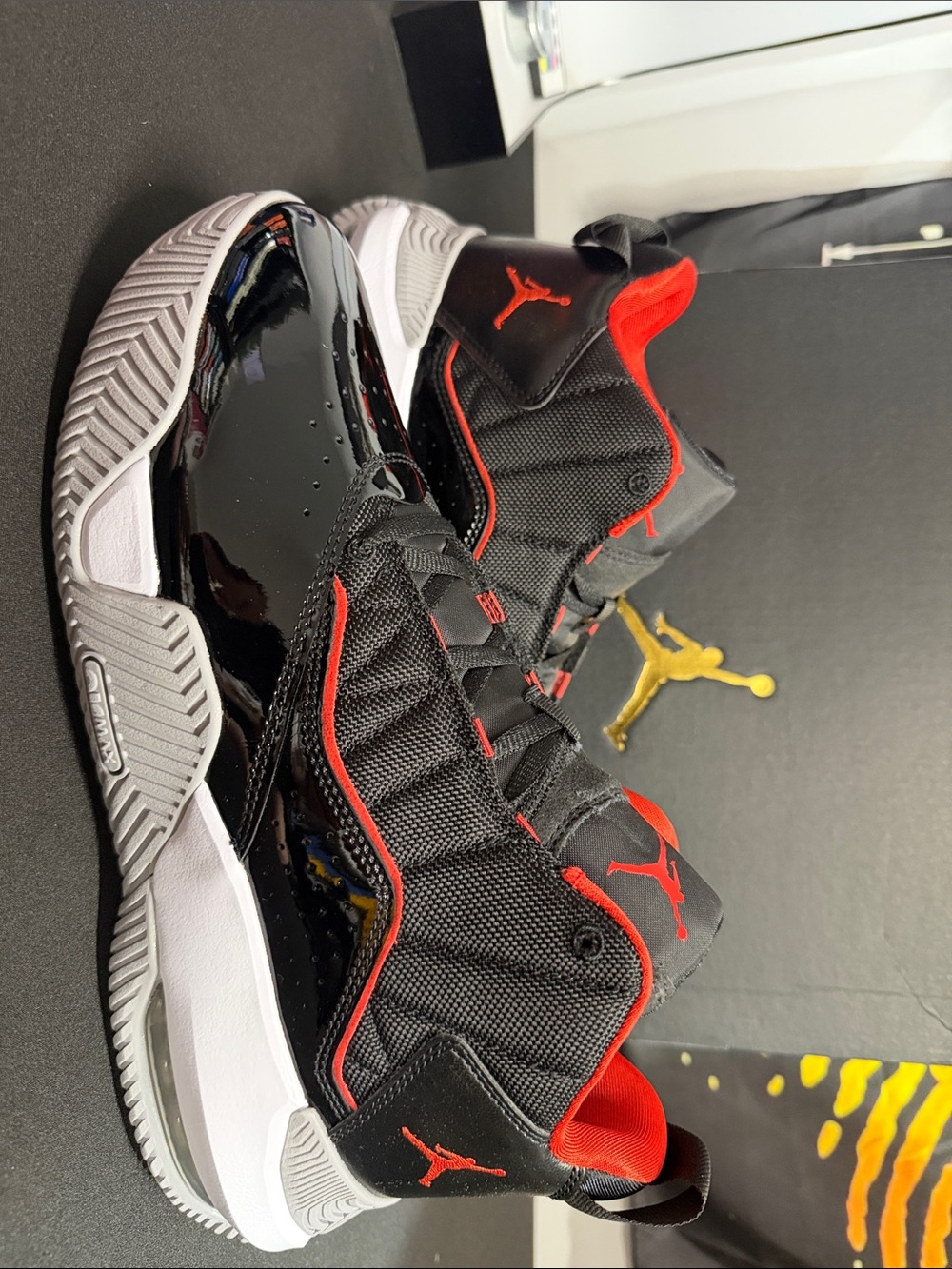 Nike Stay Loyal Black and Red Jordan Low-Top Basketball Sneakers